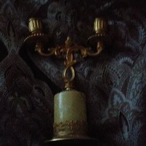 gold colored/marble feel candlestick holder